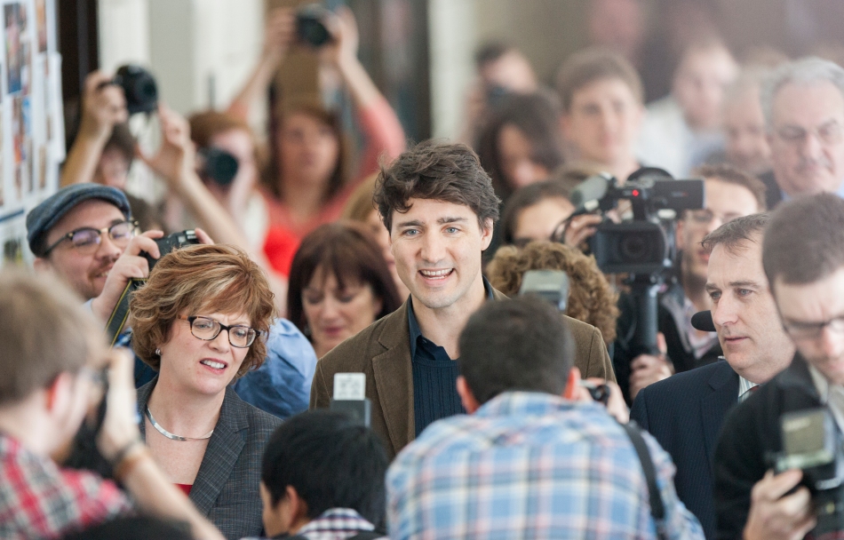 BELLEVILLE, Ont (14/2/13) - MP and Liberal leadership candidate Justin Trudeau is scrummed by students from Loyalist College's Photojournalism program during a tour of the college in Belleville Ontario on February 14.  Trudeau has been touring post-secondary institutions as part of his campaign. (Photo by Adam Dietrich)