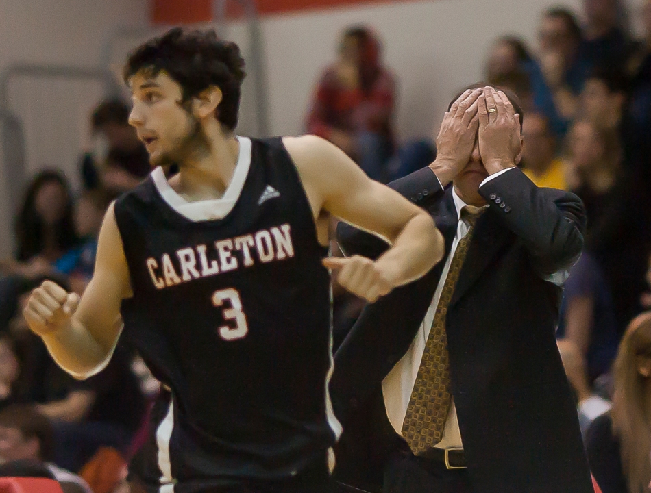 OTTAWA, Ont (19/1/13) - Carleton Raven's head coach Dave Smart reacts to a play by guard Carleton Gavin Resch during a game in Ottawa, Ontario on January 19.  Despite Smart's dramatic reaction to his teams defensive plays Carleton defeated the Queen's University Golden Gaels 104 - 63. (Photo: Adam Dietrich)