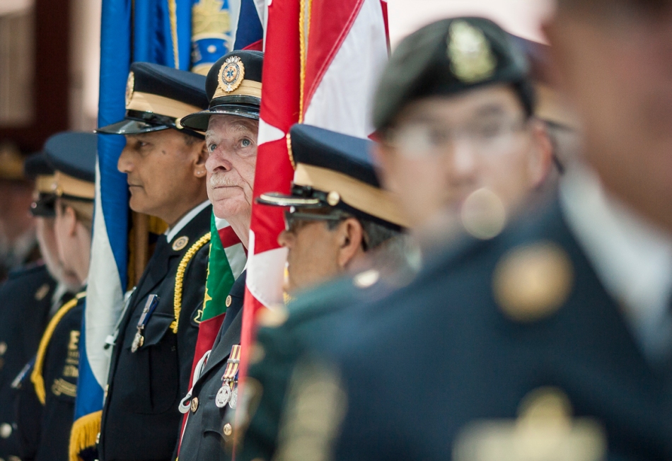 Member of the Toronto EMS Honour guard stand during the opening procession of a graduation ceremony for new paramedics on Friday. (July 19, 2013)