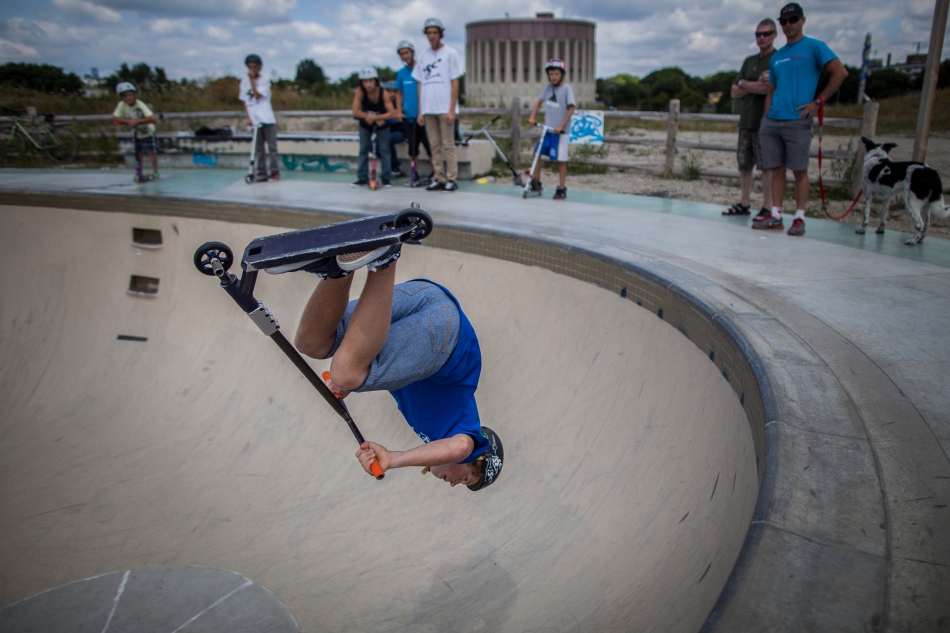 Jack Kelly a scooter rider with Scooters Canada does a back flip in a bowl at Ashbridges Bay Skatepark on Sunday.  The Scooters Canada team was on a province wide skatepark tour, doing demonstrations in six skateparks in three days over the long weekend. (August 4, 2013)