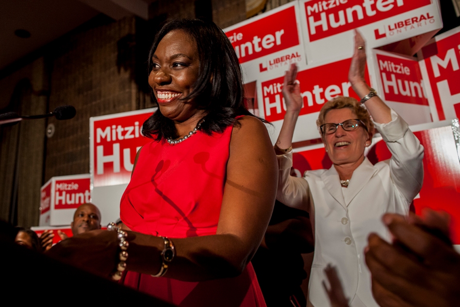 Mitzie Hunter, left, and premiere Kathleen Wynne celebrate a Liberal victory the Scarborough-Guildwood by-election on Thursday. (August 1, 2013)
