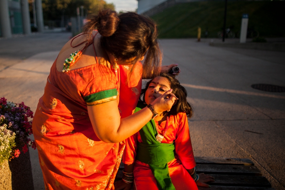 Tandra Mantri, left, applies make-up to dancer Akantsha Baish before a performance at Scarborough's Civic Centre during the Hindu Cultural Society of Canada's celebration of India's Independence on Thursday. (August 15, 2013)
