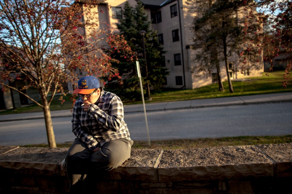 OTTAWA Ont. (12/11/13) - Martin a trans-man sits outside the Loyalist College Residence's in Belleville Ontario on November 12 where he is currently studying journalism.  (Photo Adam Dietrich)