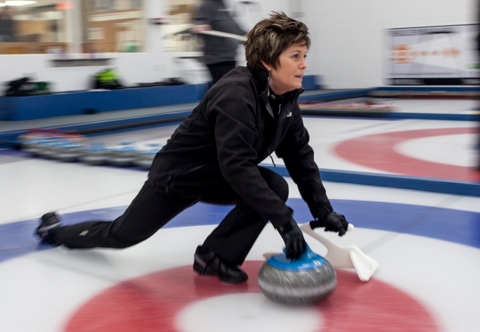 Deanne Nichol from Peace River throws a rock down the ice during the final game of the Peace River Ladies Bonspiel on March 2, 2014.  Grand Prairie's Team Sharon Chrenek team defeated Peace River's Team Deanne Nichol team in the final game 9-7 in seven ends. ADAM DIETRICH/RECORD-GAZETTE/QMI AGENCY