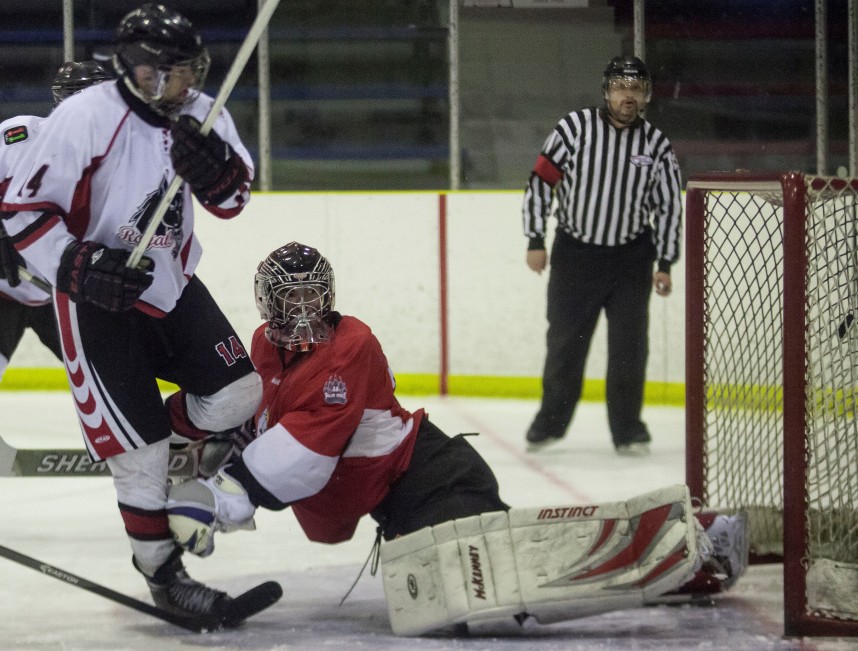 Peace River Royals forward Dolan Bjornson, puts the puck in the net during the final game of the NAMHL semi-finals against the Wainwright Polar Kings on Sunday March 16, 2014.  The Royals defeated the Kings 5-1 and won the series 2-1. ADAM DIETRICH/RECORD-GAZETTE/QMI AGENCY