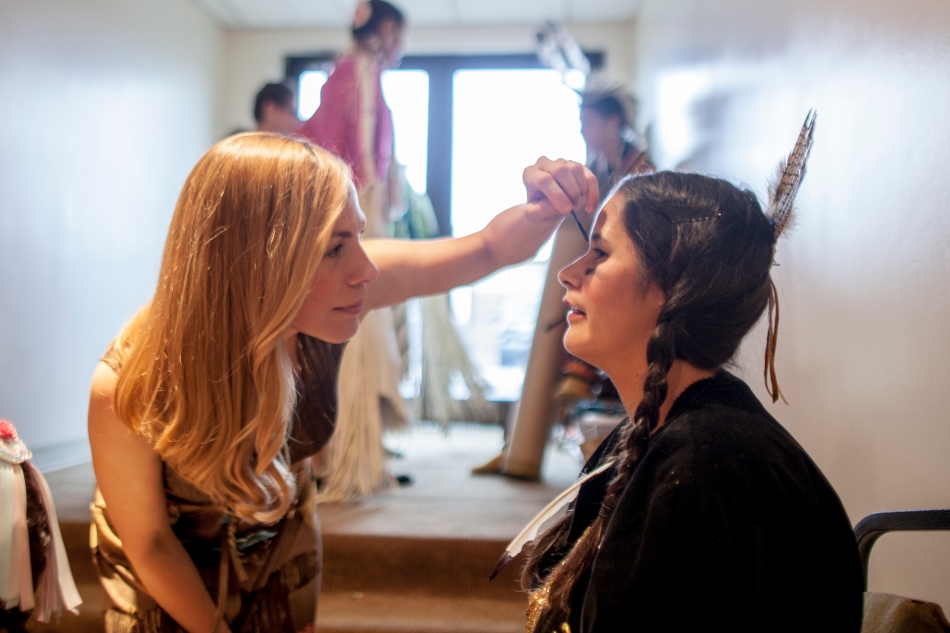 Designer Lara Flesing applies a final layer of makeup to model Valerie Ghostkeeper before the start of a fashion show held at the Sawridge Inn and Conference Centre in Peace River Alberta on Saturday May 31, 2014. The fashion show was part of a gala fundraising evening to raise money for the upcoming pow-wow. ADAM DIETRICH/RECORD-GAZETTE/QMI AGENCY