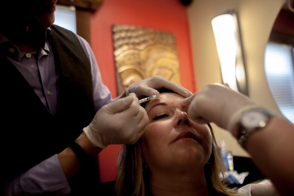 Mona Weaver has Botox injected during the opening of Zen Spa in Peace River Alberta, on Thursday June 5, 2014. Botox is one of the new services the spa offered. Adam Dietrich | Record-Gazette/QMI Agency
