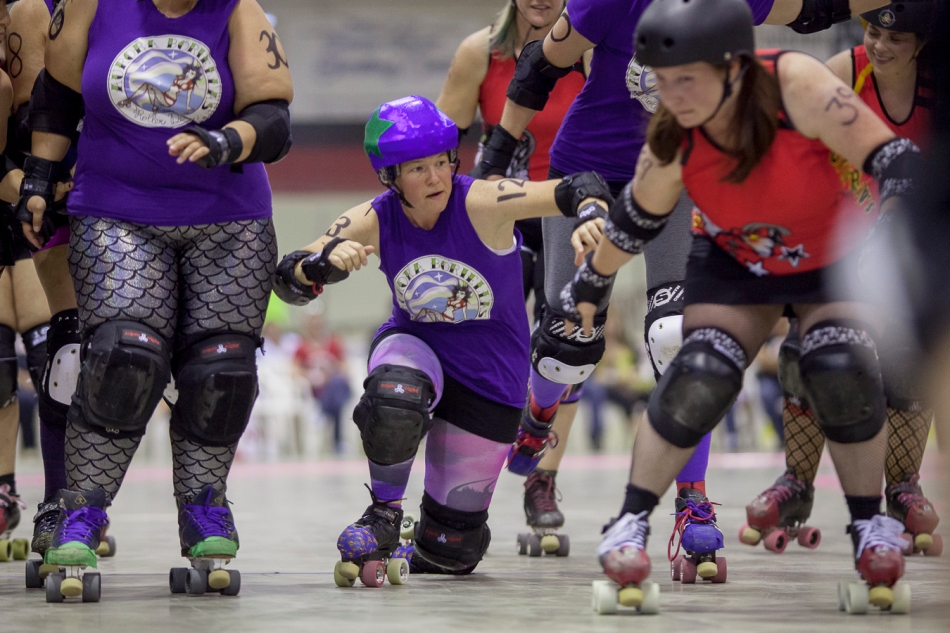 High Level Aurora Boriellas' Kiw'd Up, falls to the ground during the Solstice Slam Jam roller derby at the Baytex Energy Centre in Peace River, Alta. on Saturday, June 21, 2014. Roller Derby, typically popular in urban areas, is starting to gain popularity in Alberta's north. Adam Dietrich | Record-Gazette/QMI Agency