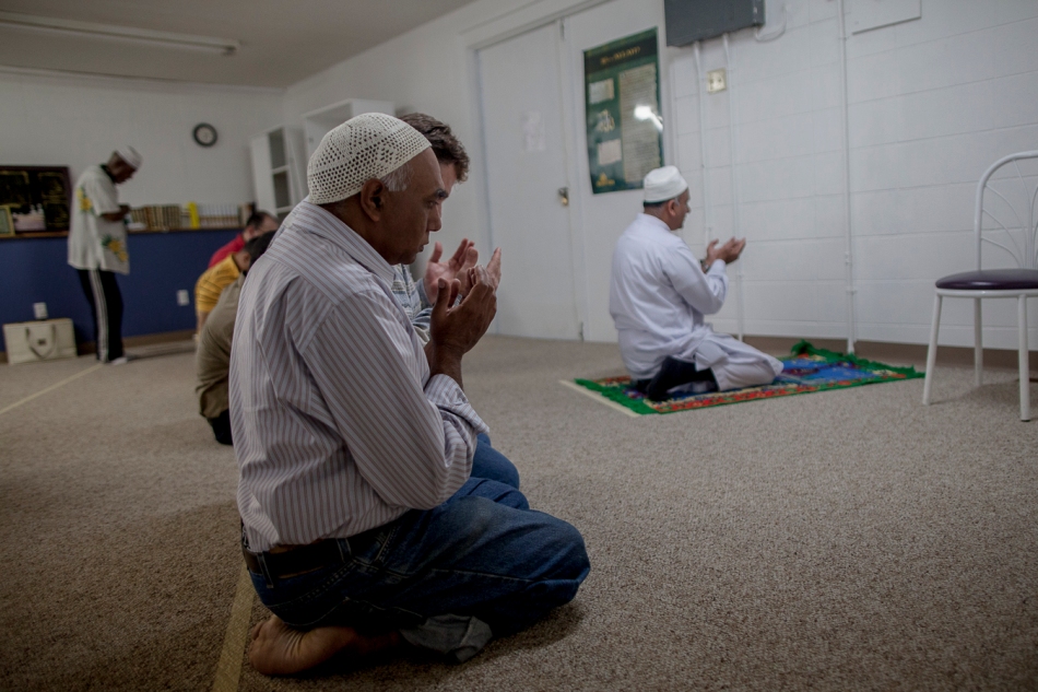  Muhammad Ashiq, left, prays with fellow Muslims at the Peace River Islamic Centre in Peace River, Alta. on Friday, June 20, 2014. Ramadan, the Muslim holy month, began on June 28, 2014. During Ramada, Muslims fast and abstain from all food and water from sunrise to sunset for 30 days. In Peace River, a small group of Muslims hold weekly prayers, alternating each week who leads the prayer. Adam Dietrich | Record-Gazette/QMI Agency